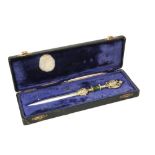 A SILVER-GILT LETTER OPENER