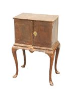 A SMALL WALNUT CABINET ON STAND, EARLY 18TH CENTURY