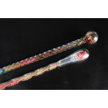 TWO VICTORIAN "END OF DAY" GLASS WALKING CANES