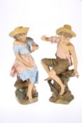 A PAIR OF GOLDSCHEIDER TERRACOTTA FIGURES