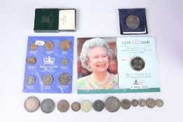 A COLLECTION OF COINS AND TOKENS, including two 1935 Crowns