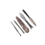 A GROUP OF FOUR THROWING KNIVES, including three World War II period.