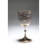 AN INDIAN WHITE METAL GOBLET