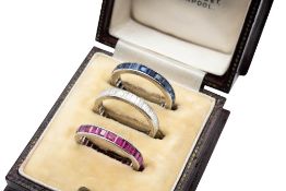 THREE GEM-SET ETERNITY RINGS