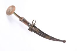 A NORTH AFRICAN TUAREG TAKOUBA SWORD WITH DAGGERS