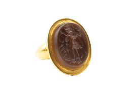 A ROMAN BANDED AGATE INTAGLIO CIRCA 2ND - 3RD CENTURY AD