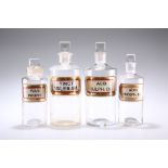 FOUR LATE VICTORIAN CLEAR GLASS LUG APOTHECARY BOTTLES