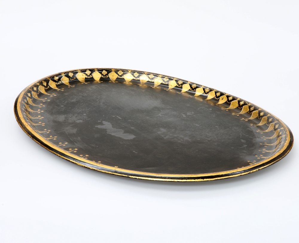 A LARGE VICTORIAN TOLEWARE TRAY, oval with gilded decoration