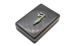 AN ART DECO ENAMEL AND GEM-SET COMPACT, PROBABLY BY CARTIER, CIRCA 1925