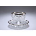 A CONTINENTAL SILVER-MOUNTED CUT-GLASS BOWL ON DISH, CIRCA 1900