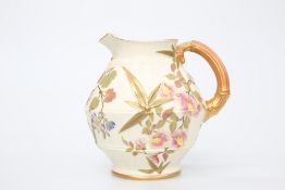 A ROYAL WORCESTER BLUSH IVORY JUG