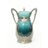 A SECESSIONIST PEWTER-MOUNTED POTTERY VASE