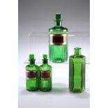 FOUR LATE VICTORIAN GREEN GLASS APOTHECARY BOTTLES