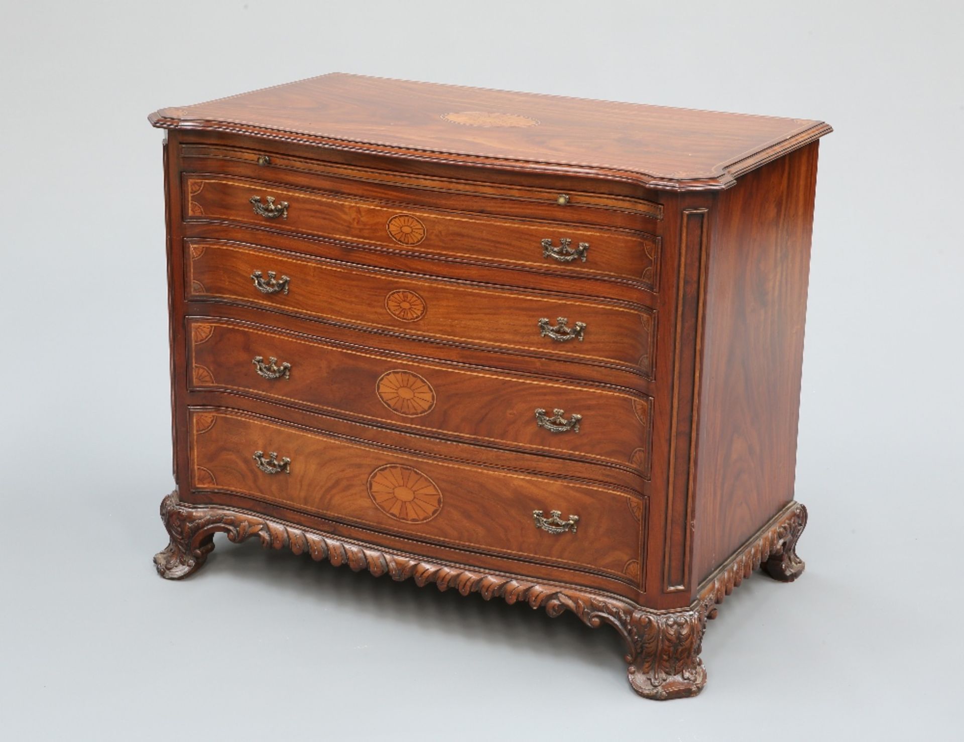 A HANDSOME GEORGE III STYLE TEAK SERPENTINE DRESSING COMMODE