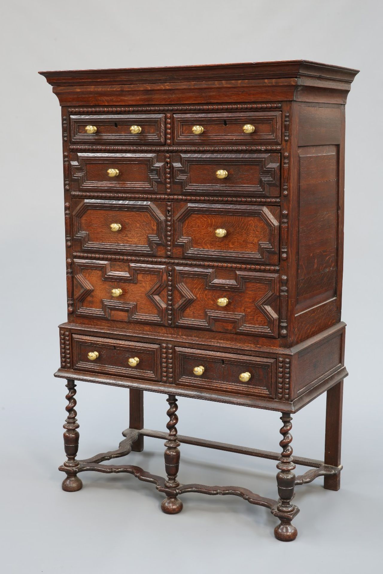 A 17TH CENTURY STYLE OAK CHEST ON STAND, 19TH CENTURY