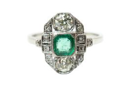 AN EMERALD AND DIAMOND DRESS RING