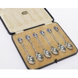A SET OF SIX SILVER AND ENAMEL ROYAL COMMEMORATIVE SPOONS