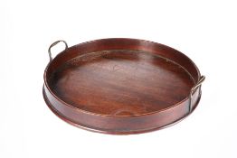 A GEORGE III MAHOGANY GALLERIED CIRCULAR TRAY