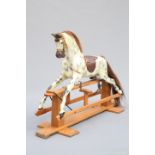 HADDON ROCKERS, A CARVED AND PAINTED ROCKING HORSE