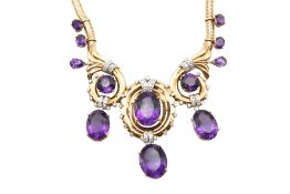 AN AMETHYST AND DIAMOND NECKLACE