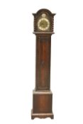 AN EARLY 20TH CENTURY OAK THREE-TRAIN GRANDMOTHER CLOCK