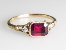 A GARNET AND DIAMOND RING