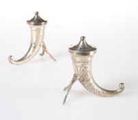 A PAIR OF NORWEGIAN STERLING SILVER SALT AND PEPPER POTS