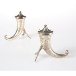 A PAIR OF NORWEGIAN STERLING SILVER SALT AND PEPPER POTS