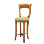 A 19TH CENTURY BEECH CELLIST CHAIR