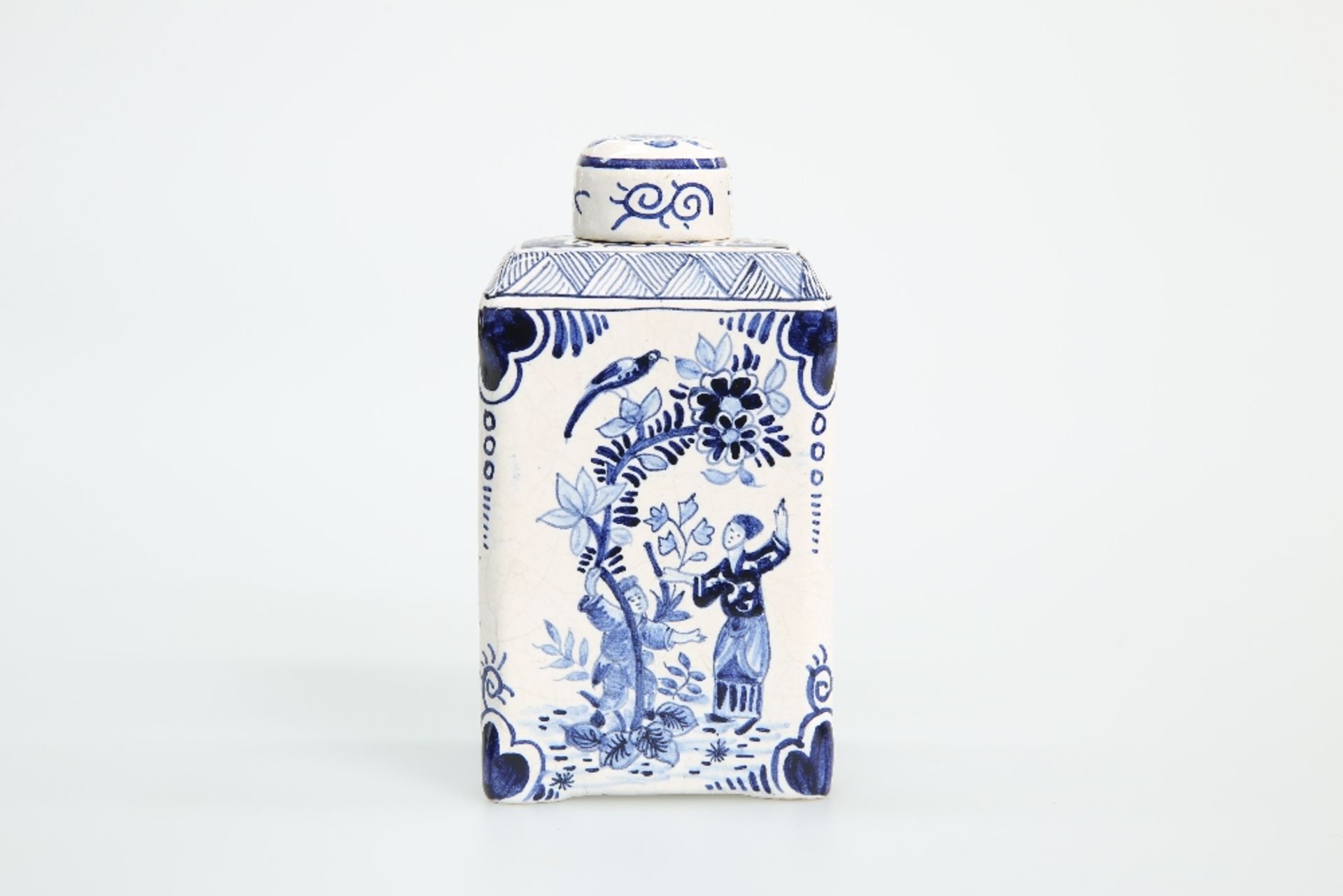 A DUTCH DELFT BLUE AND WHITE TEA CADDY AND COVER, c. 1800