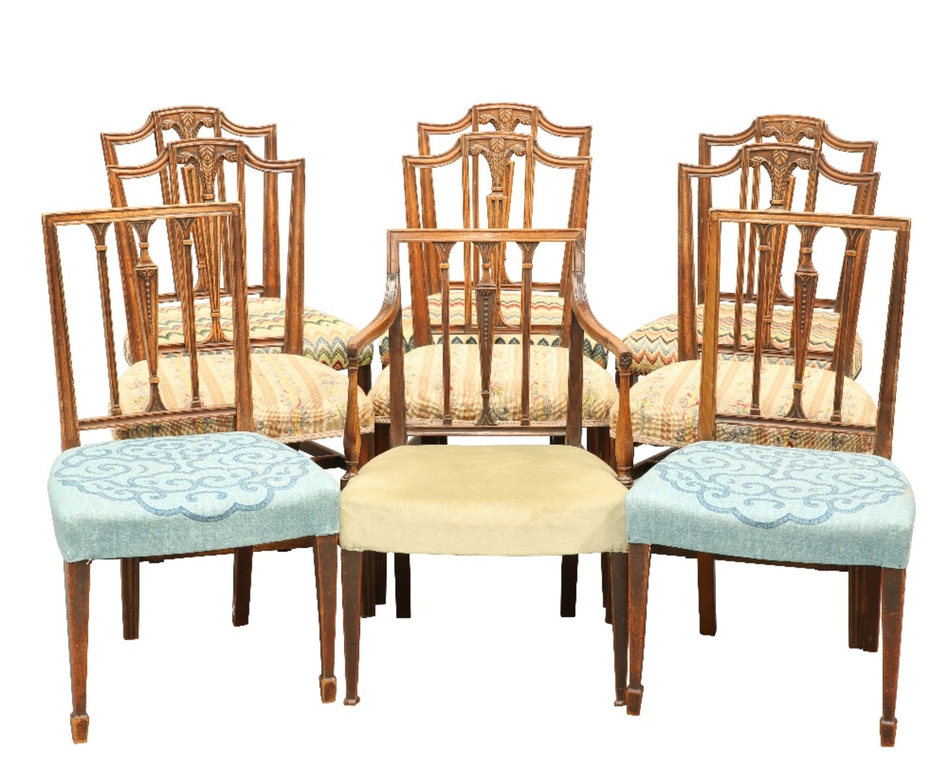 A MATCHED SET OF NINE GEORGE III MAHOGANY DINING CHAIRS