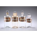 FOUR LATE VICTORIAN CLEAR GLASS LUG APOTHECARY BOTTLES