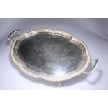 A SUBSTANTIAL SILVER TWIN-HANDLED TEA TRAY