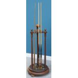 A 19TH CENTURY REVOLVING CUE RACK