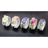 A SET OF FIVE ROYAL DOULTON NAPKIN RINGS, CIRCA 1920'S