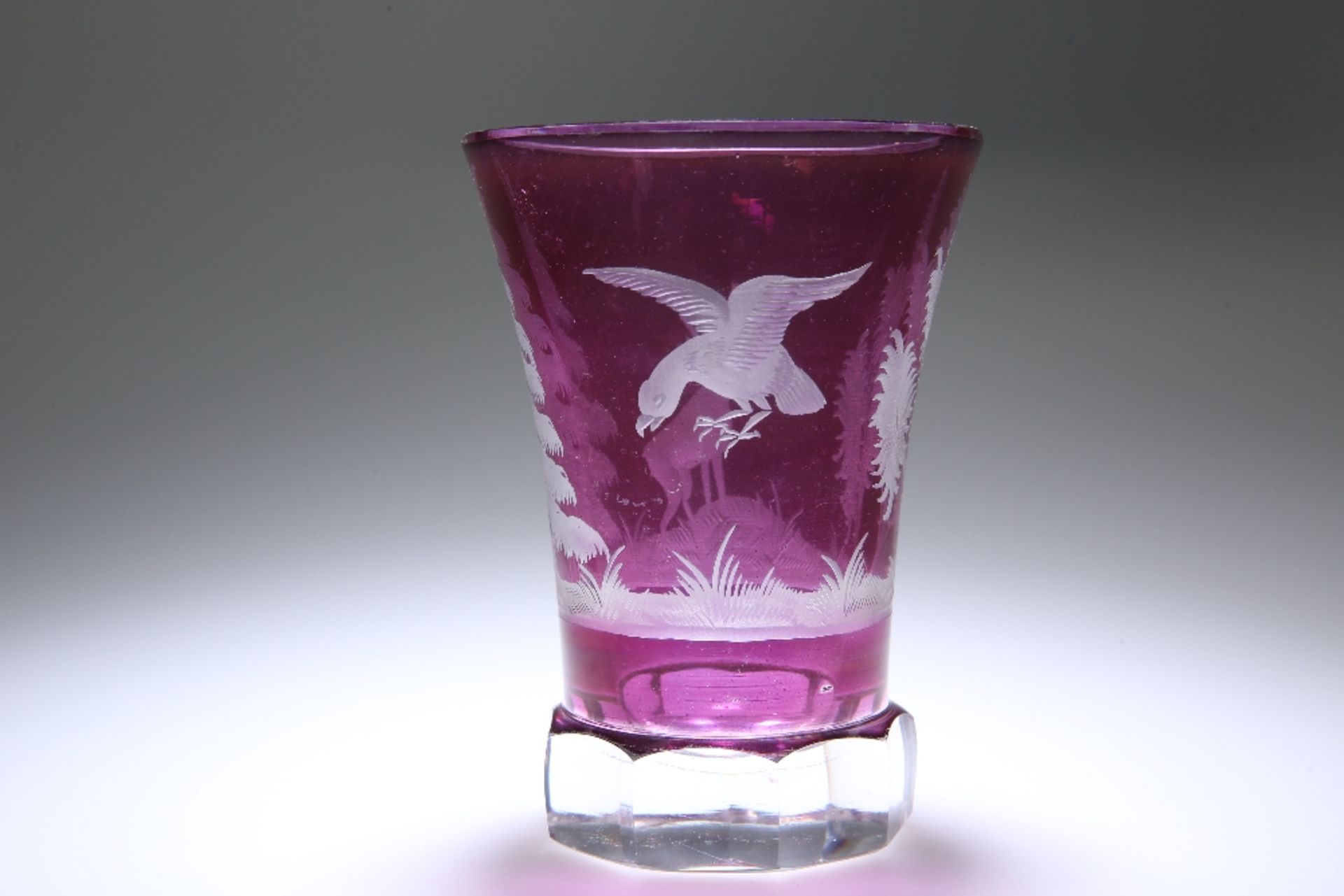 A BOHEMIAN AMETHYST GLASS BEAKER, LATE 19th CENTURY