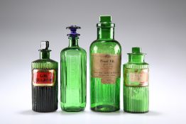 FOUR LATE VICTORIAN GREEN GLASS APOTHECARY BOTTLES