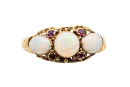 A MID 19TH CENTURY OPAL AND RUBY RING