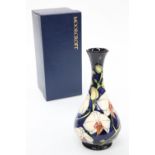 A MOORCROFT POTTERY LIMITED EDITION VASE, BY PHILIP GIBSON