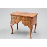 A GEORGE II WALNUT SIDE TABLE