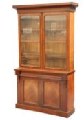 A VICTORIAN MAHOGANY BOOKCASE CABINET