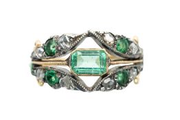 AN EMERALD AND DIAMOND RING