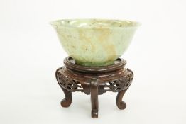 A CHINESE MOTTLED JADE BOWL