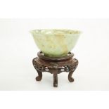 A CHINESE MOTTLED JADE BOWL