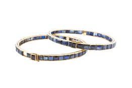 A PAIR OF SAPPHIRE BANGLES
