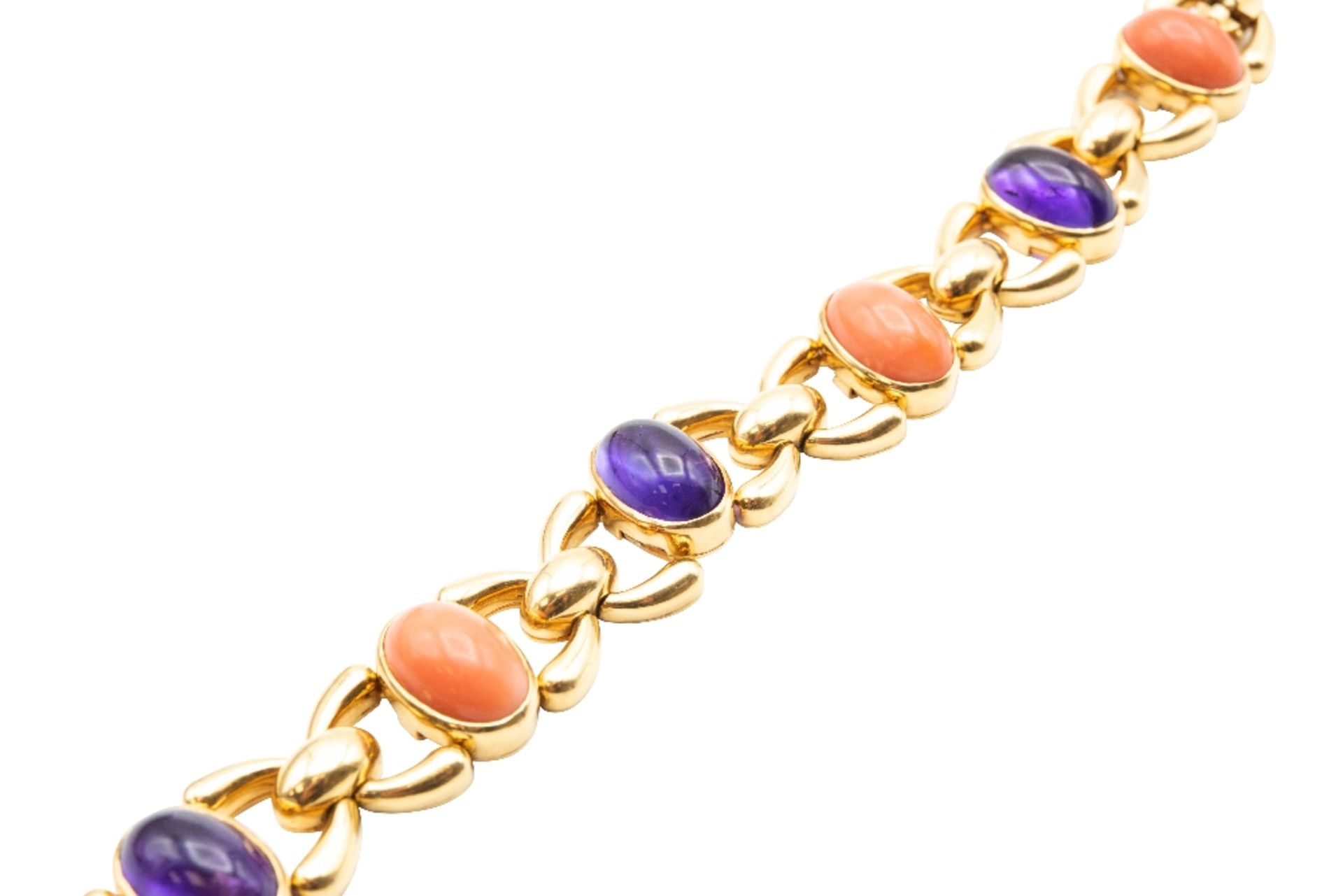 AN AMETHYST AND CORAL BRACELET, BY CARTIER