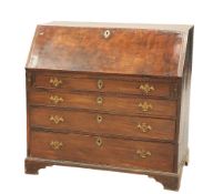 A LARGE GEORGE III MAHOGANY BUREAU