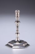 A GEORGE II SILVER TAPER STICK