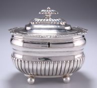 A GEORGE III SILVER TEA CADDY