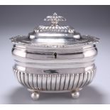 A GEORGE III SILVER TEA CADDY